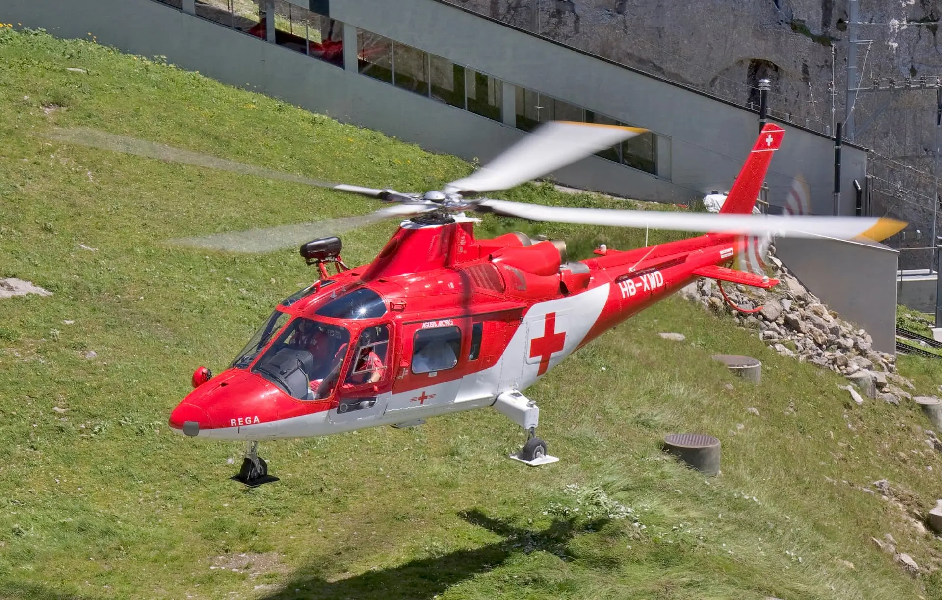 Agusta A109K2 leaves mount Pilatus after having recovered a patient