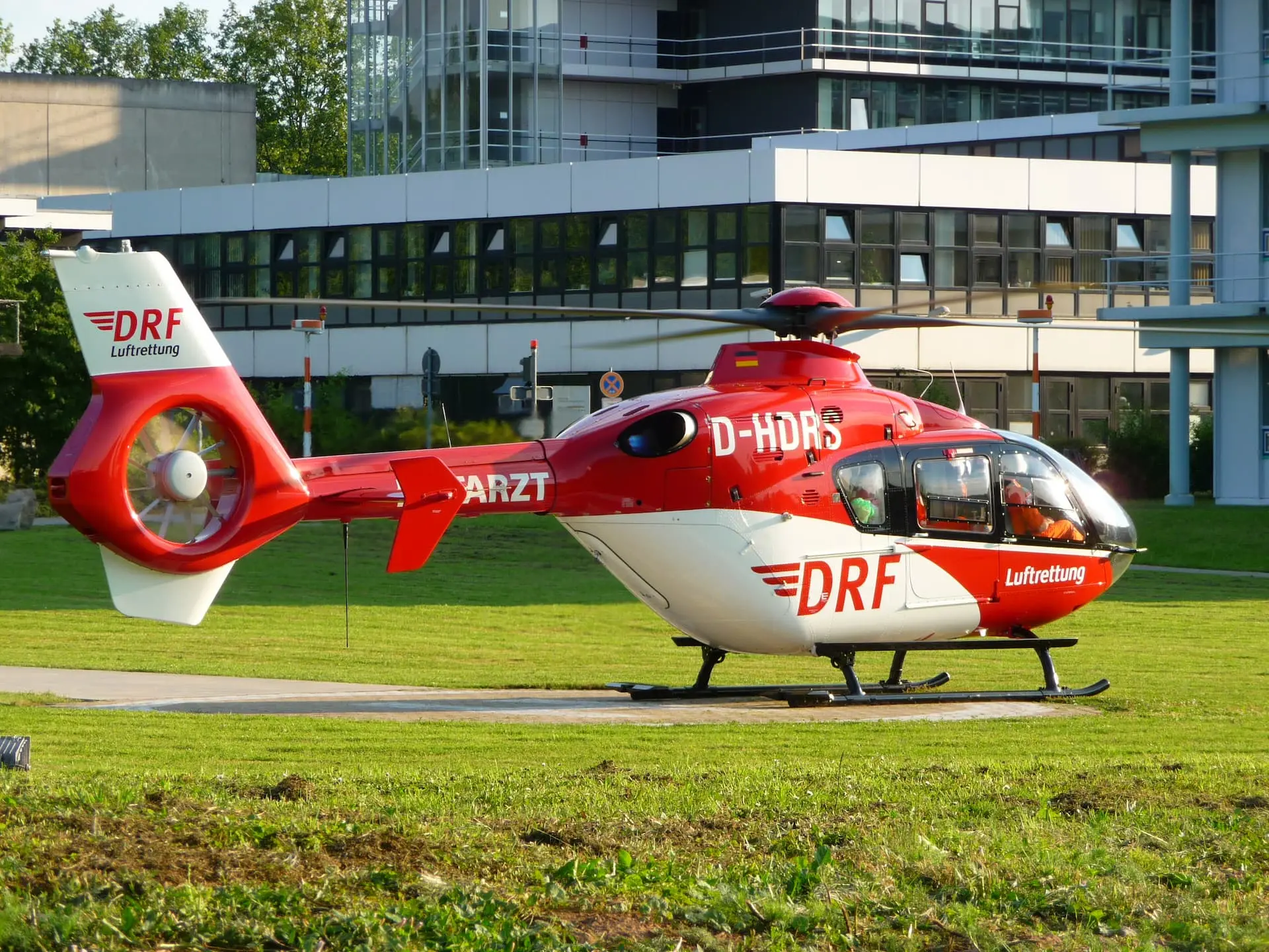 EC 135 P2+ Helicopter from DRF Luftrettung picking up a patient